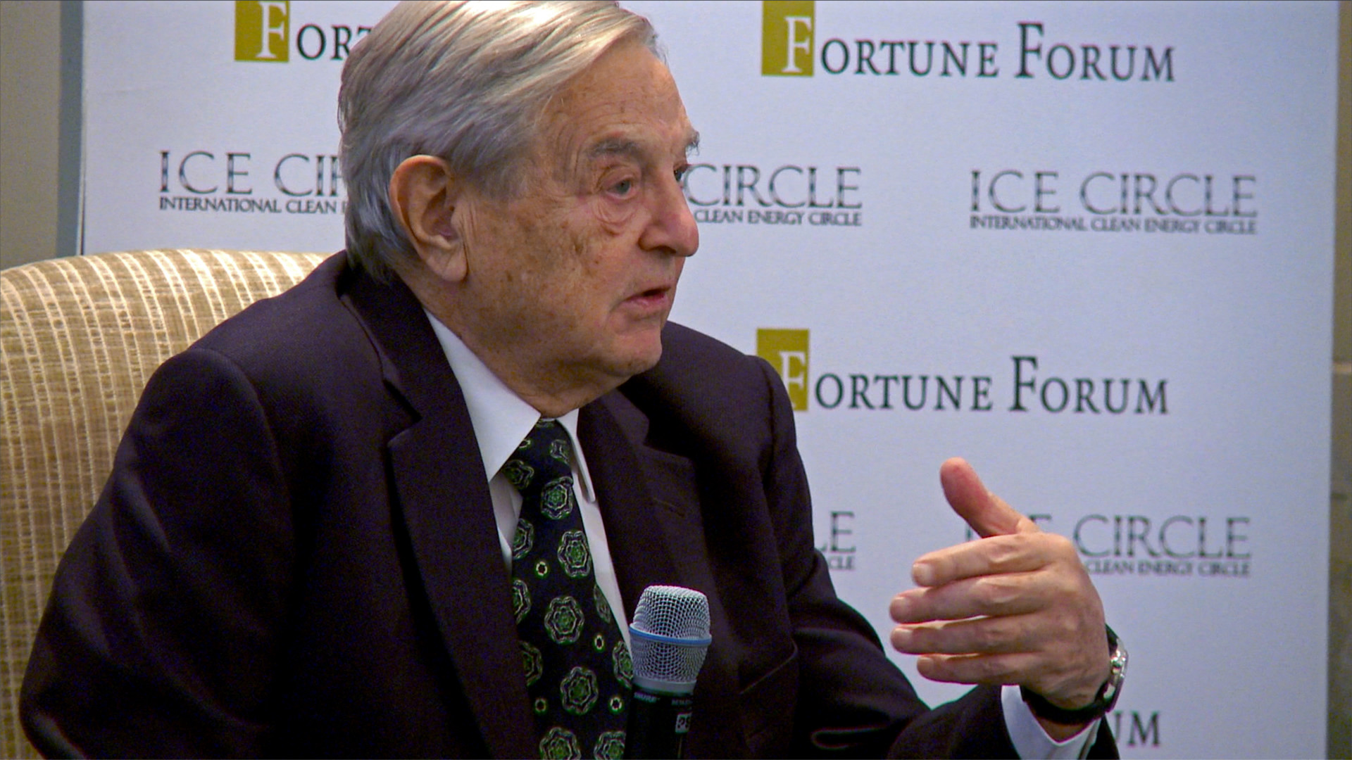 George Soros Disparity film still, George Soros at Fortune forum event