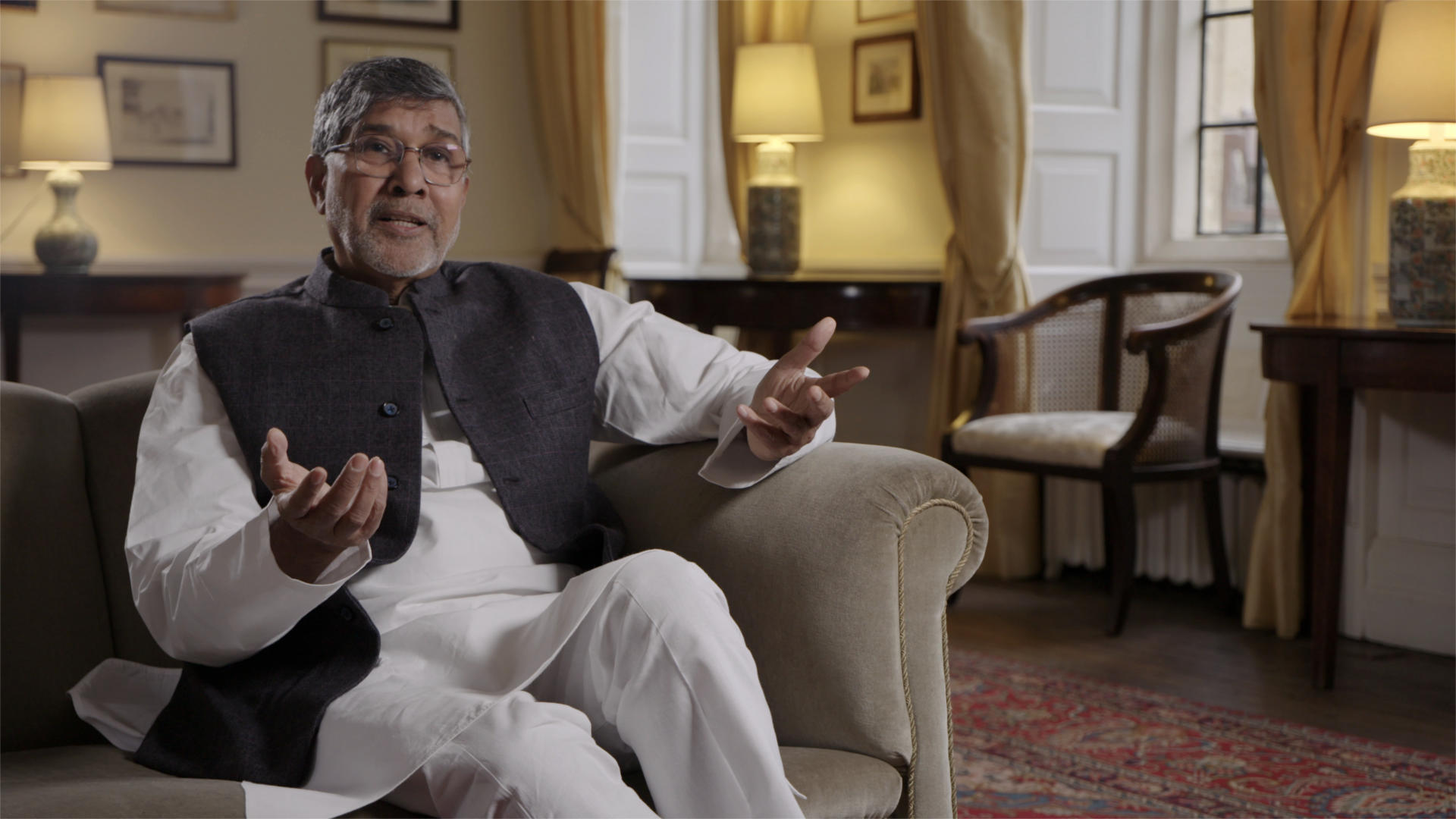 Disparity Film Still, Kailash Satyarthi sitting